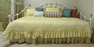 lot 127 image: Daybed Bedding Including Comforter, Sham, Mixed Throw Pillows, Bolster Bed Throw Pillow and Bed Skirt