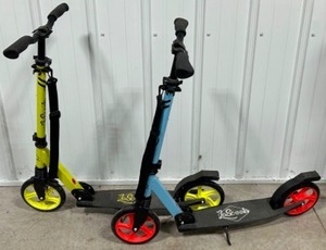 lot 82 image: Pair of LaScoota Professional Adult Kick Scooters with Big Sturdy Wheels for Ages 6, Yellow & Blue