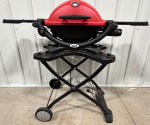 lot 93 image: WEBER Q Grill with Stand, Grill Cover, Cart and Gas Line Accessories