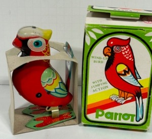 lot 71 image: Vintage BLIC Hopping Windup Tin Parrot New in Box