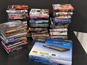 lot 116 image: Huge Lot of DVDs Contemporary Movies With SONY Blu-ray Disc DVD Player in Orig. Box