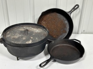 lot 237 image: Trio of CAST IRON Pots & Pans for Campfire Cooking Lodge & Amazon Basics