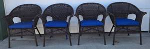 lot 248 image: 4 Outdoor Faux Wicker Chairs wBlue Cushions 