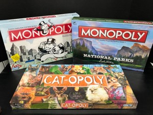 lot 336 image: MONOPOLY ANYONE Trio of Monopoly Variations Includes Classic, Cat-opoly & National Parks Version All New and Sealed
