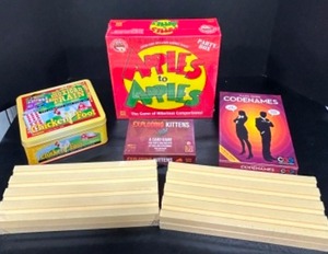 lot 337 image: New Factory Sealed Board Games Including Apples to Apples, Code Names, Exploding Kittens & Mexican Train