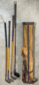 lot 363 image: Antique 4 Wood Shafted GOLF CLUBS & Stove Pipe Canvas Golf Bag