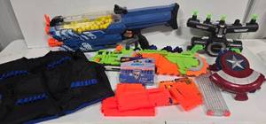 lot 371 image: NERF Play - Rival Nemesis Blaster, Marvel ShieldGun, Zombie Brainsaw, & Space Shooting Blow Toy