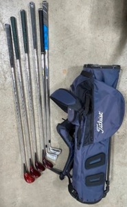 lot 366 image: TITLEIST Lot of Golf Clubs Irons & Drivers In a Large Logo Golf Bag