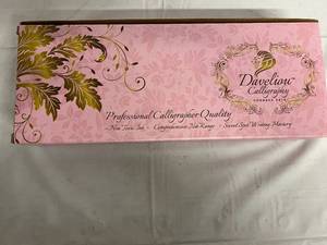 lot 148 image: Daveliou Caligraphy Set - Pink