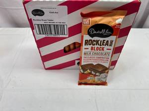lot 195 image: II. 12x 6.4oz Rock Lea Road Milk Chocolate Block