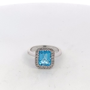lot 8 image: 14k White Gold Blue Topaz with Natural Diamond Ring