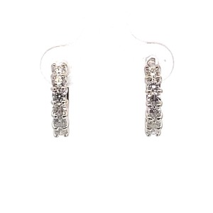 lot 11 image: 18k White Gold Natural Diamond Huggie Earrings