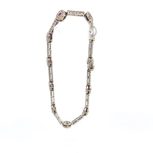 lot 16 image: 18k White Gold Ruby and Natural Diamond Bracelet