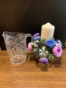 Centerpiece with candle and Plastic Water Pitcher