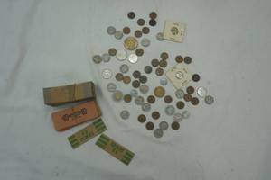 lot 86 image: Coin lot. Indianhead, buffalo, wheat, Canadian and coin sleeves.