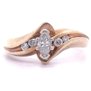 Marquise Diamond Curved Bypass Channel Ring in 14k Yellow Gold