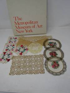 Stored lace collection and doily in box from  Metropolitan