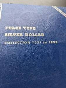 Peace Type Silver Dollar Collection (19211935) in Blue Collector Folio  (incomplete)