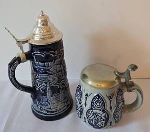 lot 95 image: Pair of Hinged German Beer Steins