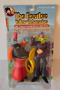 lot 36 image: Collectible The Beatles Yellow Submarine Sgt. Peppers Lonely Hearts Club Band George with Snapping Turk Figures