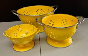 lot 164 image: Three Bright Yellow Collanders