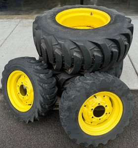 lot 10 image: JOHN DEERE COMPACT TRACTOR WHEEL KIT