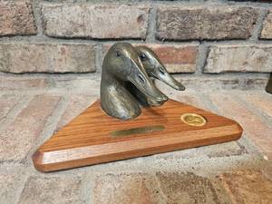 lot 49 image: Big Sky Carvers Brass Duck Busts