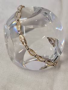 lot 1 image: Stunning 10k Yellow Gold Diamond Bracelet  Baguettee Stones  11 grams  8 inches