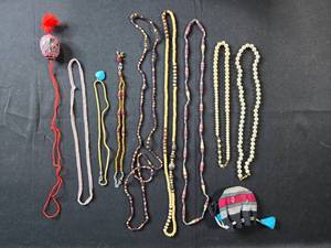 lot 77 image: Collection of Handmade Beaded Necklaces with Traditional Pouch
