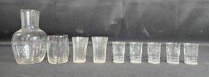 lot 136 image: Miscellaneous Wine Carafe Set with 8 Glasses - Perfect for Entertaining