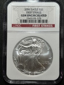 lot 64 image: 2006 Silver Eagle NGC First Strike Gem Uncirculated