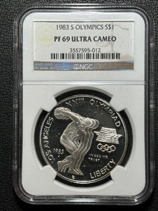 lot 65 image: 1983-S Olympics Silver Dollar Proof NGC PF69 Ultra Cameo