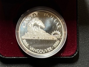 lot 112 image: 1986 Canada Silver Dollar Vancouver