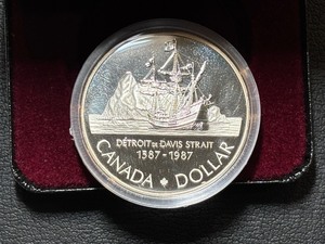 lot 116 image: 1987 Canada Silver Dollar Detroit De Davis Strait
