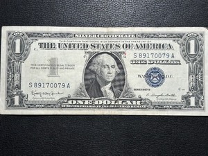 lot 117 image: 1957 B Blue Seal $1 Dollar Silver Certificate