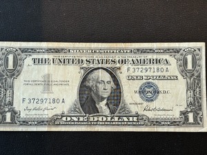 lot 192 image: 1957 Blue Seal $1 Dollar Silver Certificate