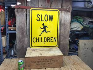 lot 128 image: Vintage Slow Children Metal Sign 18 x 24