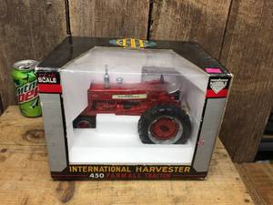 lot 174 image: SpecCast 116 International Harvester 450 Farmall Tractor