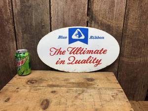 lot 262 image: Vintage Blue Ribbon Oval Metal Sign 16 34 x 9 12