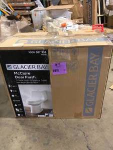 lot 42 image: Glacier Bay McClure 12 inch Rough In One-Piece 1.1 GPF1.6 GPF Dual Flush Elongated Toilet in White Seat Included Missing Pieces Customer Returns See Pictures