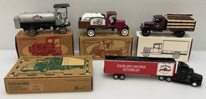 lot 30 image: Misc. Ertl Brand Jim Beam Die-Cast Car Banks (NIB)