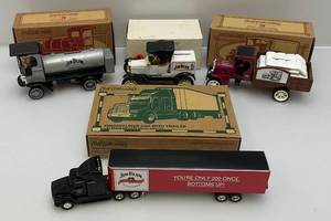 lot 38 image: Misc. Ertl Brand Jim Beam Die-Cast Car Banks (NIB)