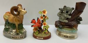 lot 47 image: Misc. Animal Decaters Including Ram (Head Glued On), Koala Bear & Miniature Cardinal Decanters (Empty)