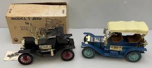 lot 77 image: Jim Beam Collectible Decanters Model T Ford (Black) & Thomas Flyer (Blue) EMPTY