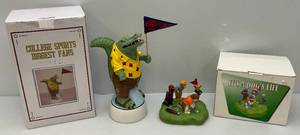 lot 122 image: Two Figural Decanters 1 Its A Dogs Life Golf Themed & 1 College Sports Biggest Fan Decanter Alligator In Original Boxes (EMPTY)