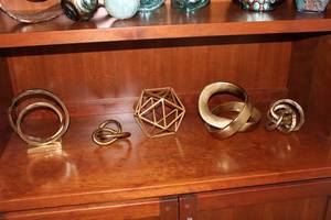lot 1 image: Collection of 5 Decorative Gold-tone Sculptures - Unique Art Pieces