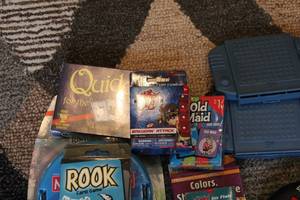 lot T-11 image: Assortment of 7 Fun Board and Card Games - Includes Family Favorites