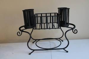 lot 74 image: Decorative Black Metal Holder with 4 Cylindrical Cups