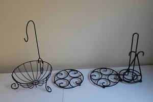 lot 82 image: Set of 4 Decorative Black Metal Kitchen Holders