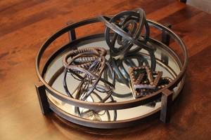 lot 101 image: Decorative Centerpiece Tray with Assorted Metal Orbs